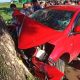 Mobil yang menghantam pohon di pinggiran jalan setelah bertabrakan dengan pengendara motor (Dokumentasi: Ist)