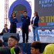 Ketua DPW Nasdem Sulut Victor Mailangkay bersama Caleg DPR RI Felly Estelita Runtuwene (FER) saat kampanye akbar partai Nasdem Sulut di Area Pohon Kasih Kawasan Megamas Kota Manado, Senin (5/2/2024). (Foto: Ridho L Tobing)