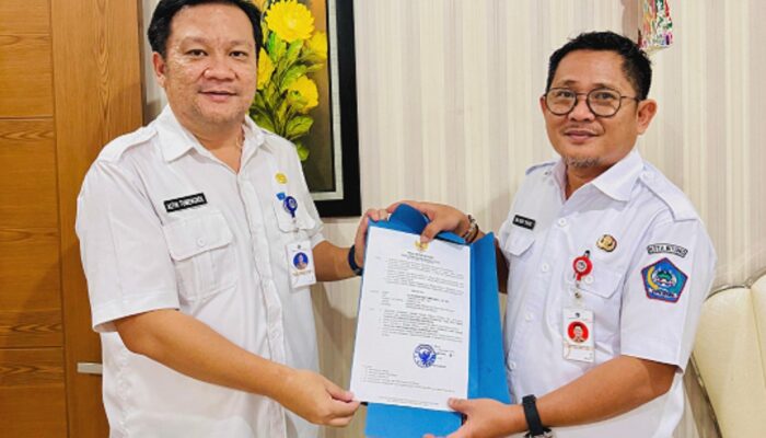 Walikota Hengky Honandar Resmi Tunjuk Altin Tumengkol Jabat Plt Kadis Kominfo Kota Bitung