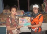 Penyerahan bantuan Bank SulutGo untuk warga korban bencana banjir bandang di Siau, Kabupaten Kepulauan Sitaro.