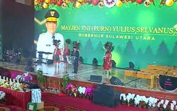 Gubernur Sulut, Yulius Selvanus saat menyampaikan sambutan pada acara Natal dan Kunci Taong Kerukunan Keluarga Kawanua.