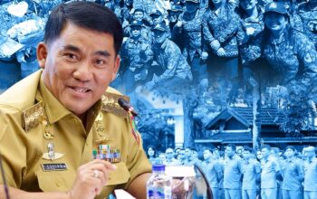 Gubernur Sulut, Mayjen TNI (Purn) Yulius Selvanus SE dengan latar para ASN Pemprov Sulut. (Foto: Istimewa)