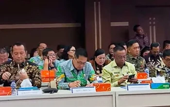 Walikota Bitung Hengky Honandar SE saat menghadiri forum Dedicated Team Meeting RIRU Sulut di Kantor Perwakilan BI Sulawesi Utara, Kamis (21/5/2026). (Foto: Dok. Istimewa)
