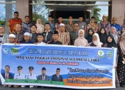 Walikota Bitung Hengky Honandar bersama jajaran LPTQ dan para duta Al-Qur'an dalam acara pelepasan Kafilah MTQ XXXI Kota Bitung menuju tingkat Provinsi Sulut, Minggu (5/7). (Foto: Istimewa)
