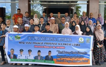 Walikota Bitung Hengky Honandar bersama jajaran LPTQ dan para duta Al-Qur'an dalam acara pelepasan Kafilah MTQ XXXI Kota Bitung menuju tingkat Provinsi Sulut, Minggu (5/7). (Foto: Istimewa)