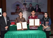 Penandatanganan MoU antara Badan Keahlian DPR RI dan Universitas Sam Ratulangi (UNSRAT) terkait penyusunan RUU Perlelangan di Kampus UNSRAT, Manado, Sabtu (25/7/2026). (Foto: Istimewa)
