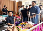 WUJUD EMPATI: Ketua TIDAR Sulawesi Utara, Standius Bara Prima (kanan) bersama Walikota Kotamobagu, dr. Weny Gaib (kiri), saat menjenguk dan memberikan dukungan moril kepada keluarga korban insiden kecelakaan Drag Race Kotamobagu di RSUP Prof. dr. R.D. Kandou, Manado, Rabu (12/8/2026). (Foto: Istimewa)
