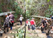 Hukum Tua Desa Kumelembuai Jerry Langkai memimpin warga dan perangkat desa saat kerja bakti membenahi saluran air dan jaringan pipa di Kumelembuai, Minahasa Selatan, Rabu (26/8/2026). (Foto: Istimewa)