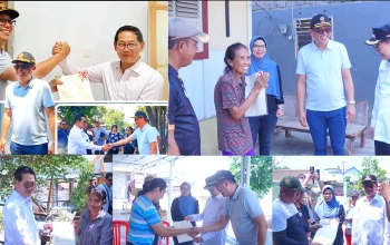 Walikota Bitung, Hengky Honandar, bersama Kepala Kantor Pertanahan Kota Bitung, Steven Octovia Kennedy Wowor, menyerahkan langsung sertifikat tanah program PTSL kepada warga dalam rangkaian HANTARU ke-66, Jumat (25/9/2026). (Foto: Istimewa/ Dok. SUDARA.ID)