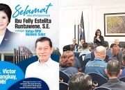 Dr. J. Victor Mailangkay, SH, MH, menyampaikan ucapan selamat kepada Felly Estelita Runtuwene, SE, sebagai nakhoda baru DPW Partai NasDem Sulawesi Utara. (Foto: Istimewa)